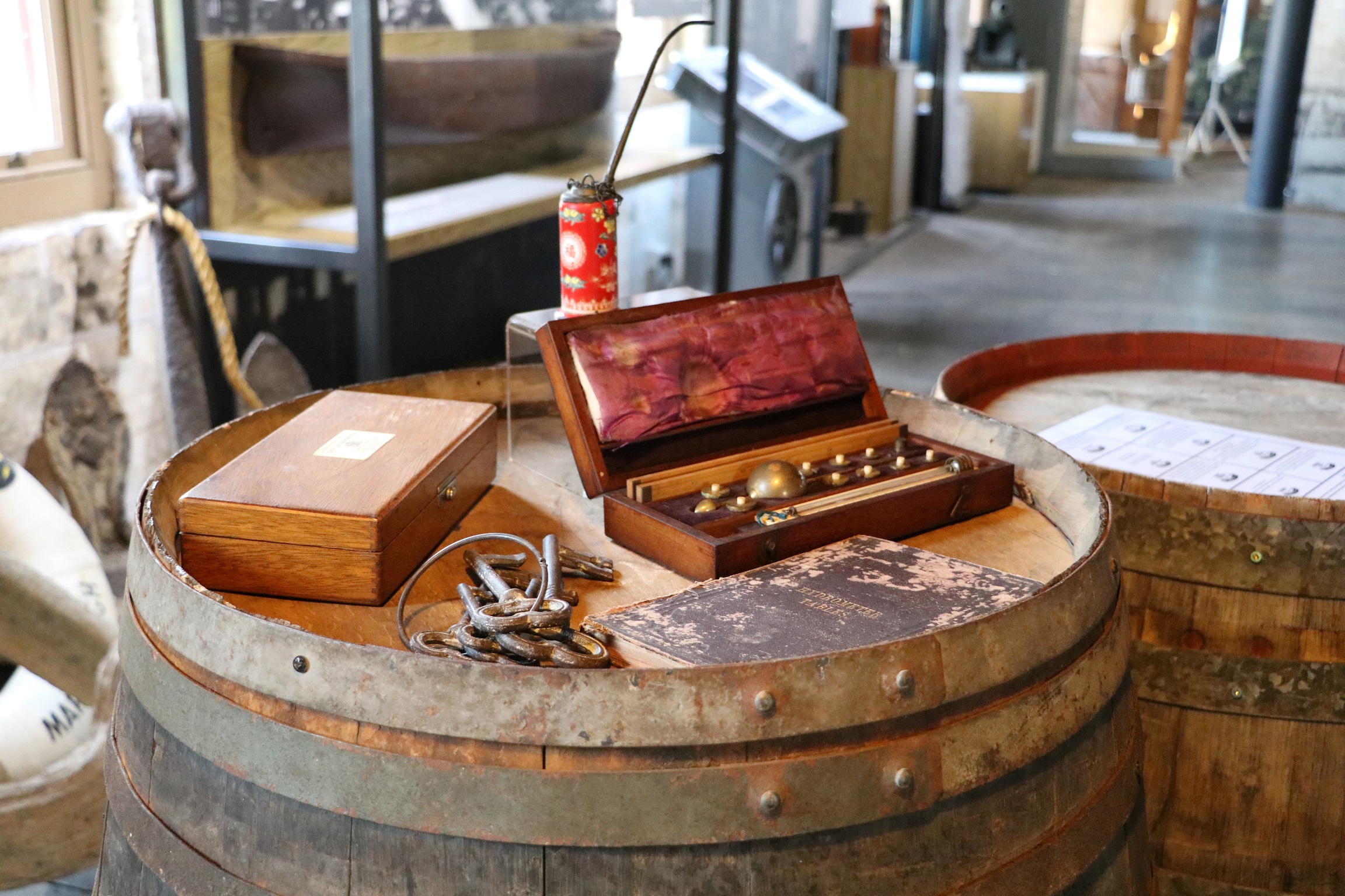 Artefacts on display on a barrel at the Bond Store