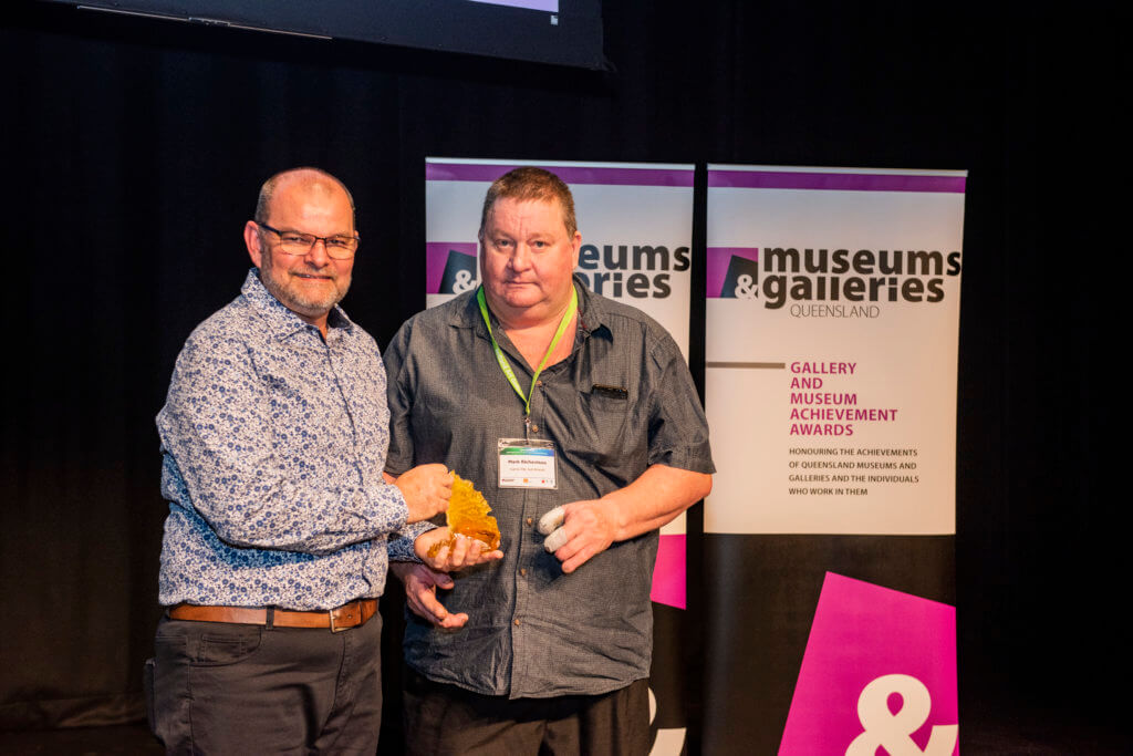 Mark Richardson, Cairns RSL Sub-branch accepting a Gallery and Museum Achievement Award on behalf of Craig Maher
