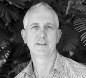 A headshot of M&G QLD board member Tony Martin