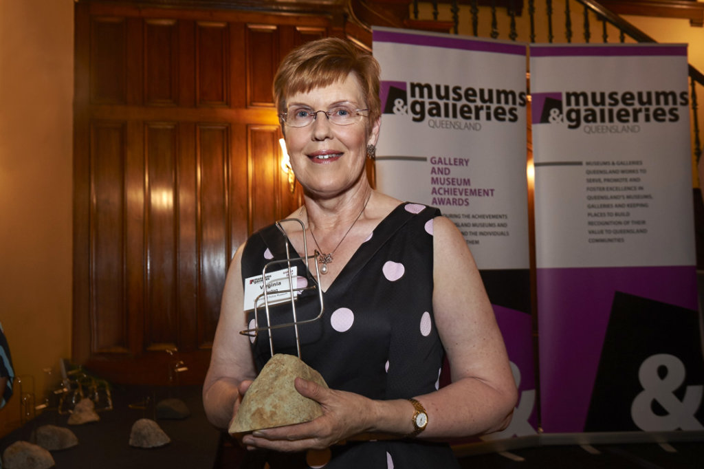 Virginia Gordon accepting a Gallery and Museum Achievement Award