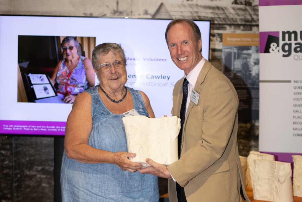 Prudence Cawley accepting a Gallery and Museum Achievement Award