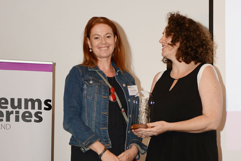 Dr Joanna Wills, Museum Development Officer for Far North Queensland, accepting a Gallery and Museum Achievement Award